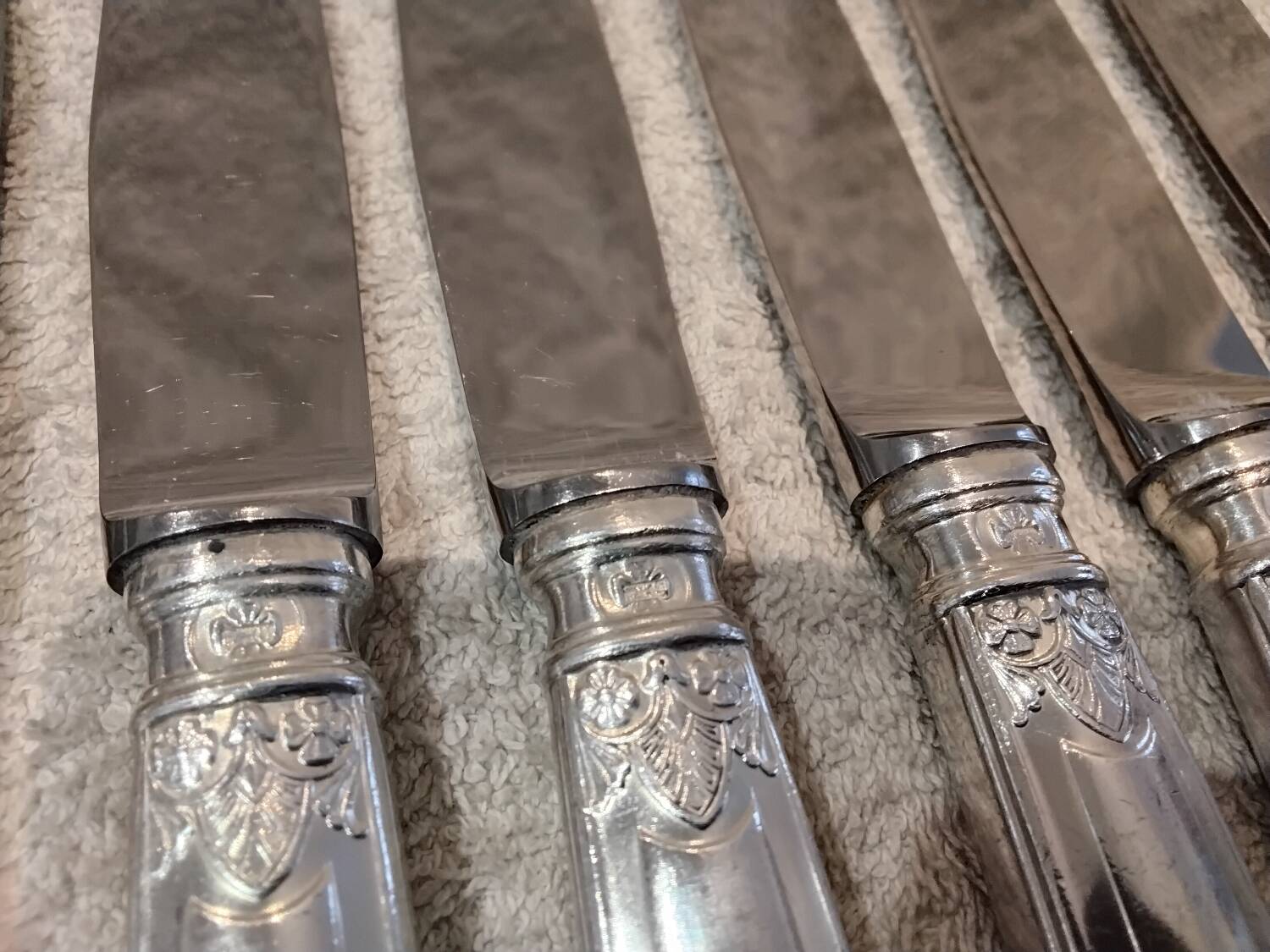 12 silver-plated metal table knives by the silversmith Ravinet Denfert, Empire style, model 81.