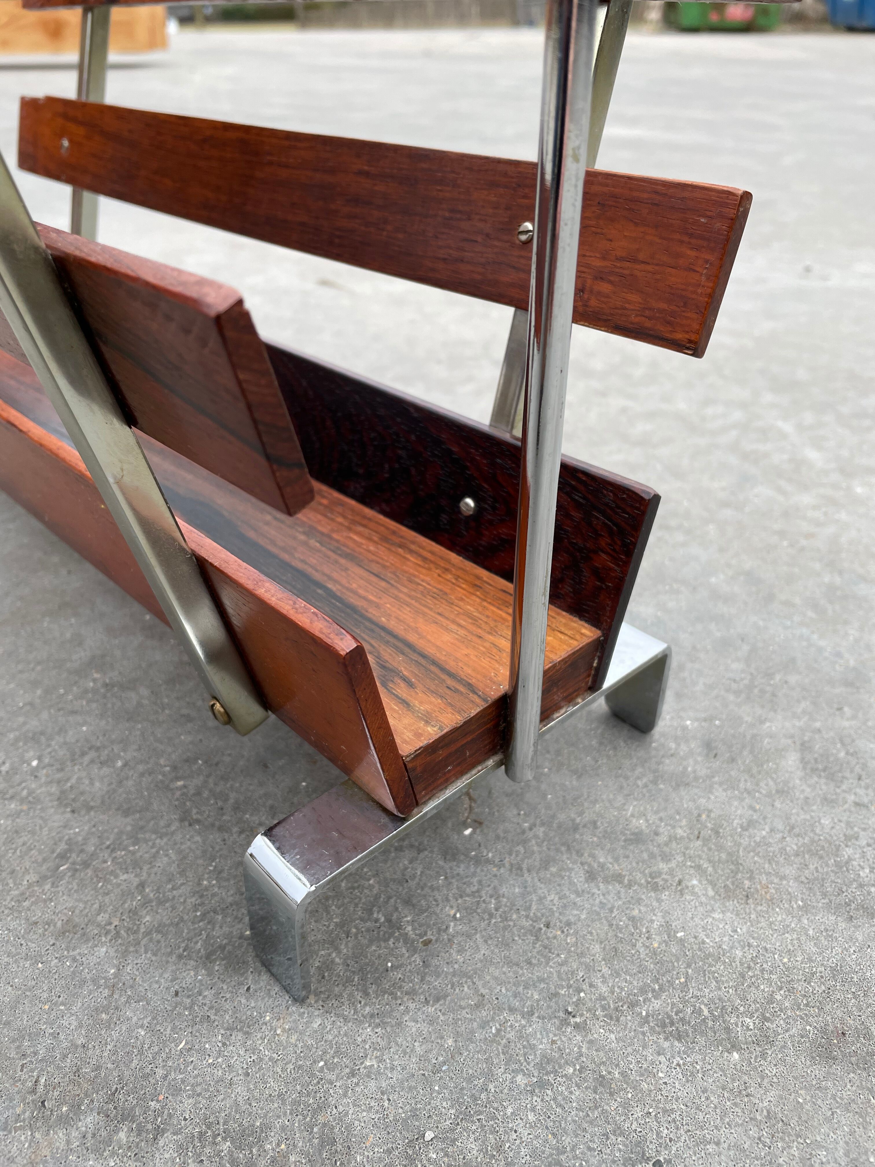 Vintage magazine rack from  rosewood and chrome design