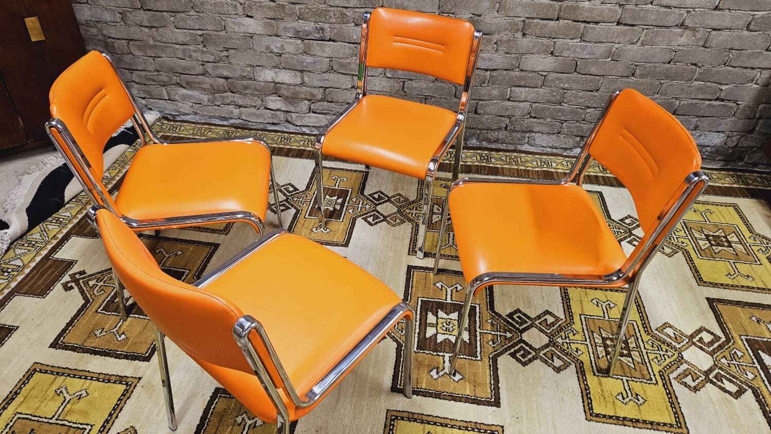 Set of 4 vintage chrome skai orange chairs 1970