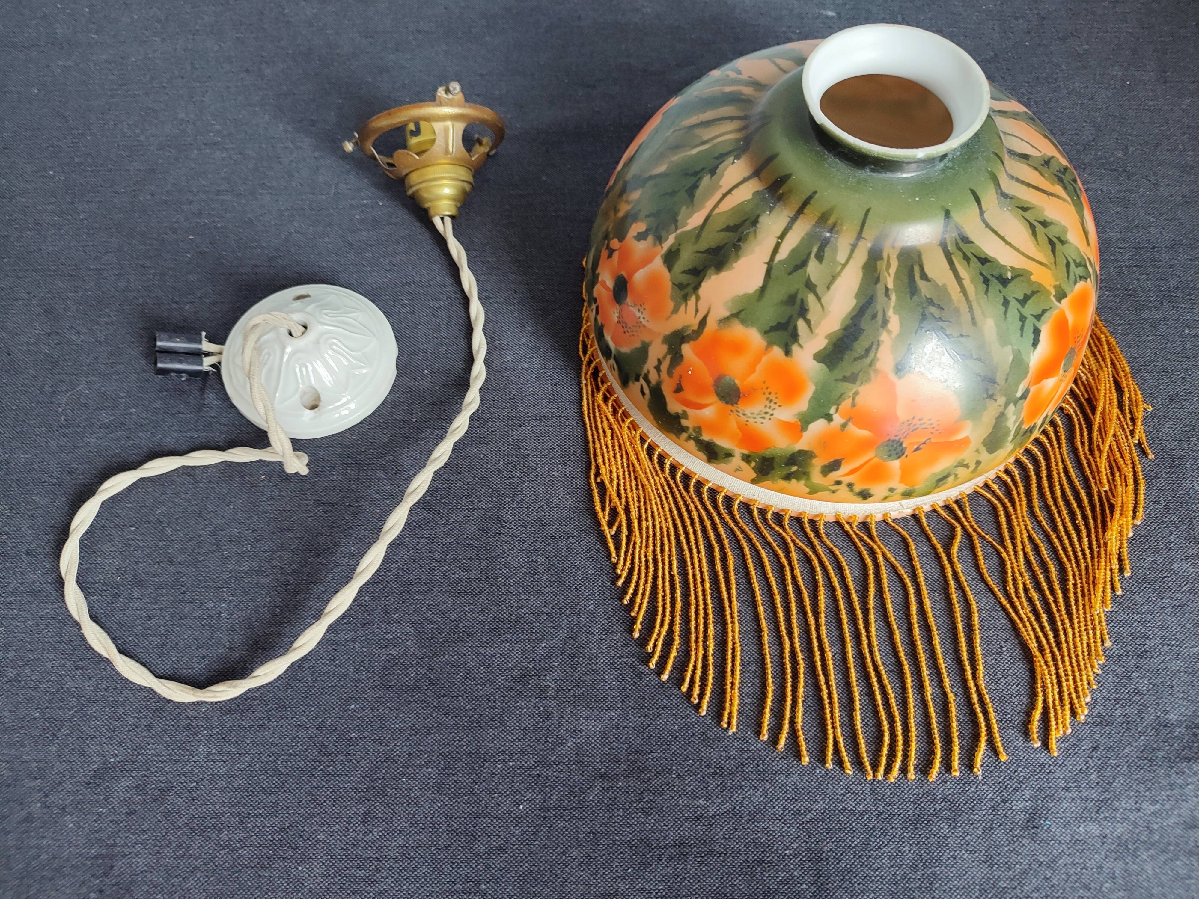 Old opaline and its tassels hanging lamp