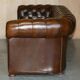 Restored Chesterfield leather sofa in vintage Art Deco style