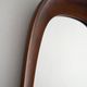 Scandinavian vintage mirror with curved mahogany frame