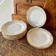 Set of 9 dessert plates in white and gold porcelain