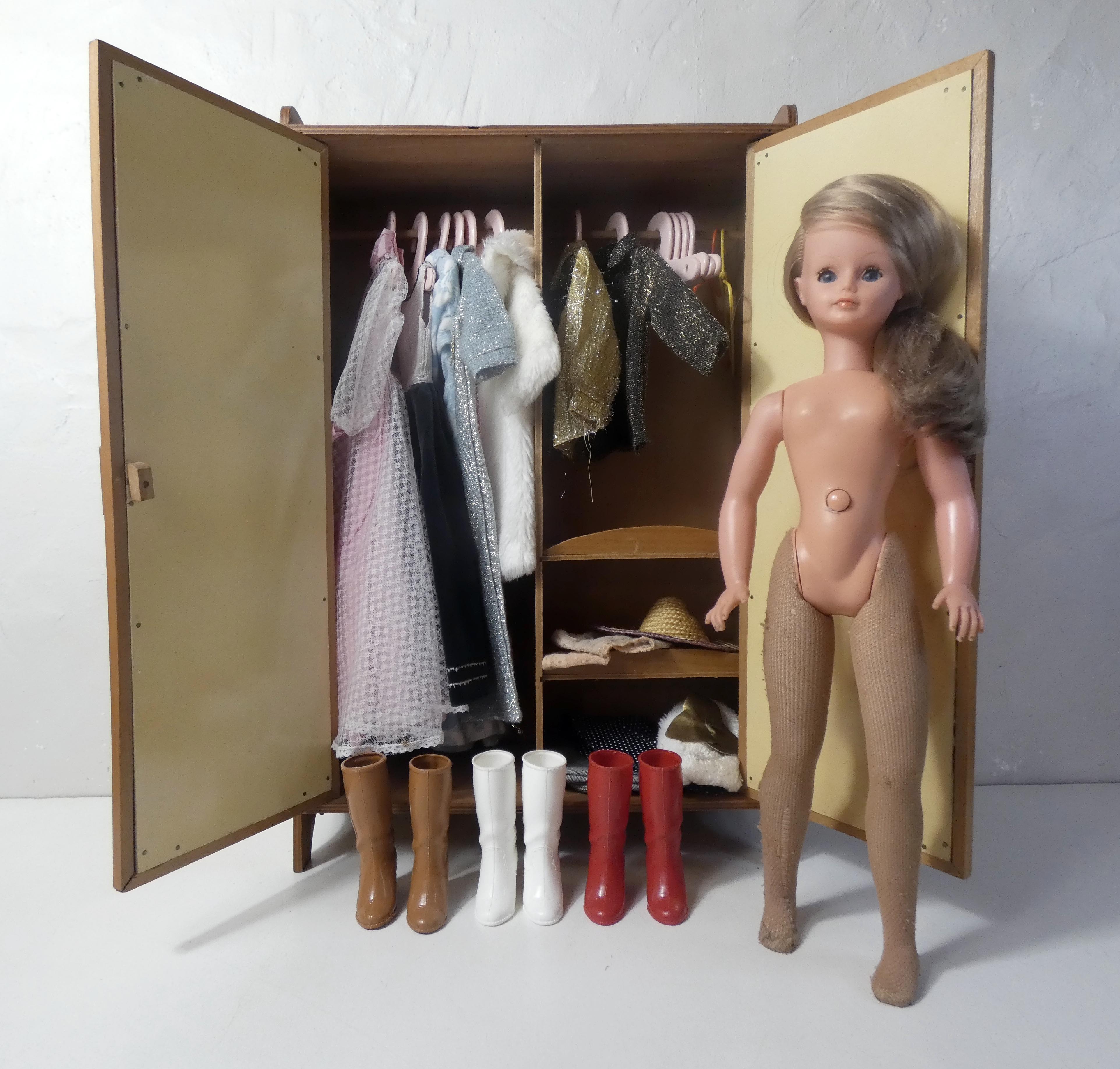 Rattan doll cabinet