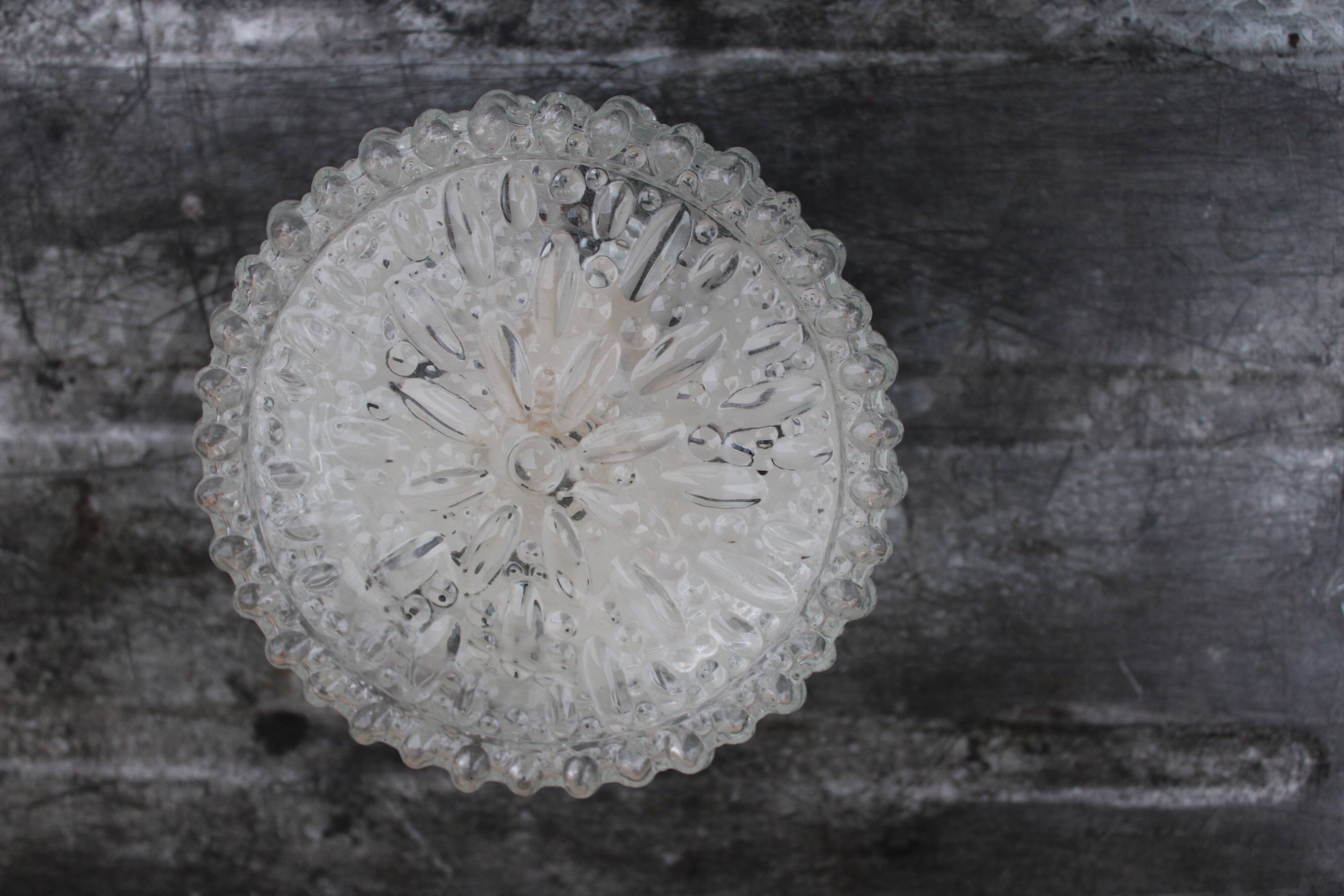 Moulded glass ceiling light