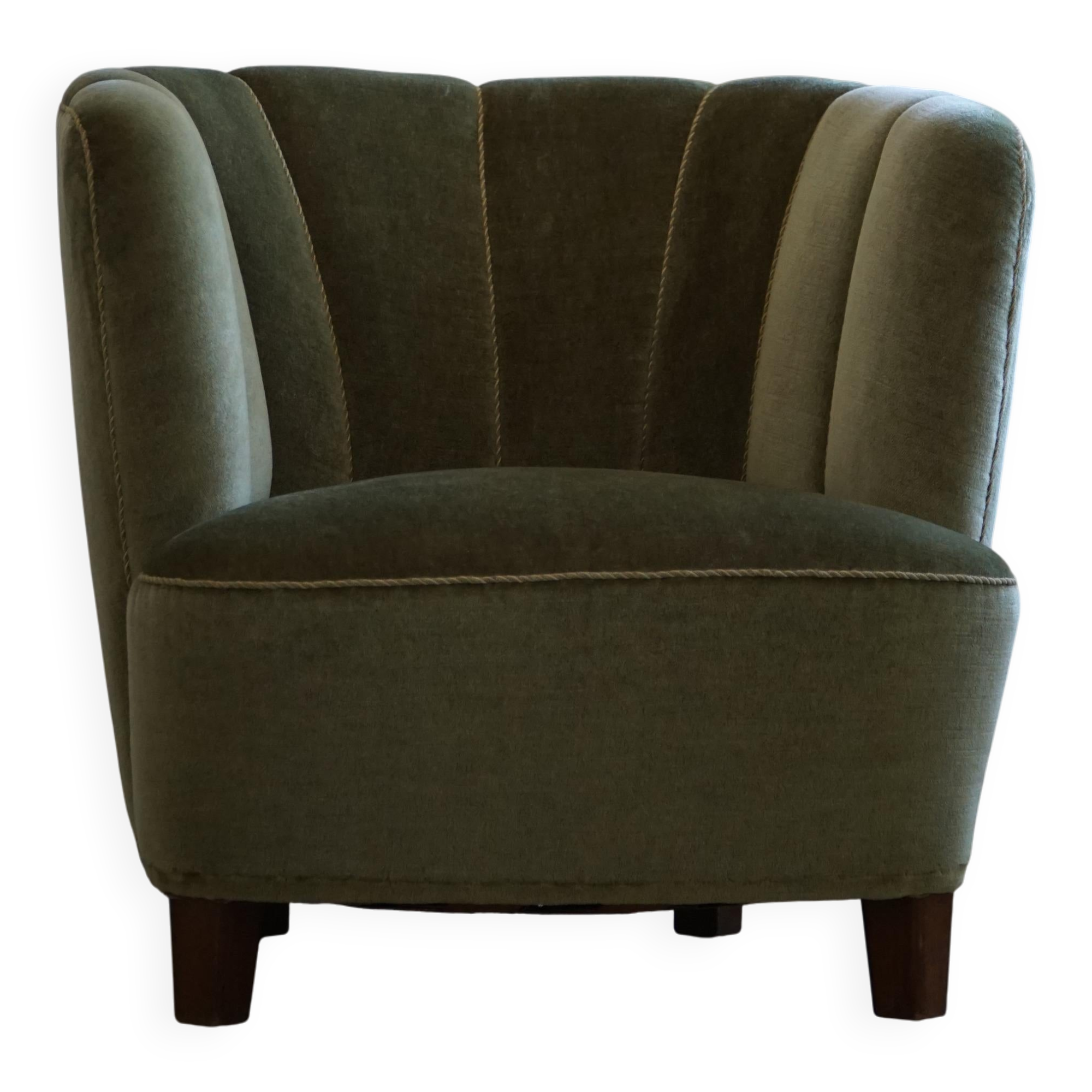 Curved Danish club chair from the mid-century, in the style of Viggo Boesen, 1940s.