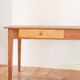 Old wooden farm table Sisters High School