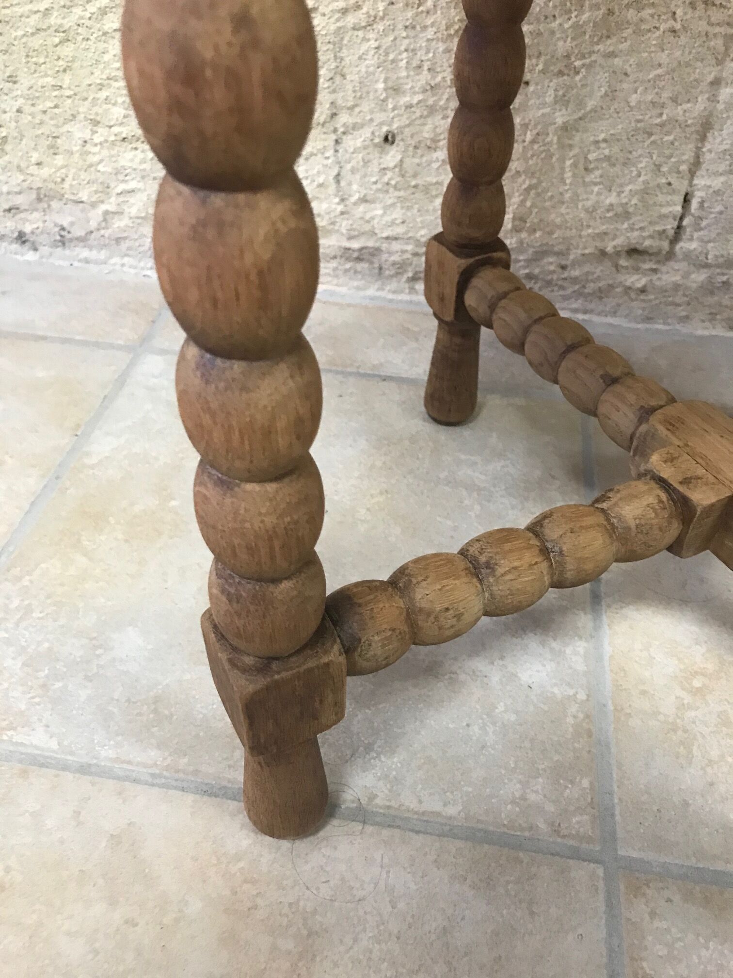 Round wooden side table