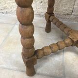 Round wooden side table