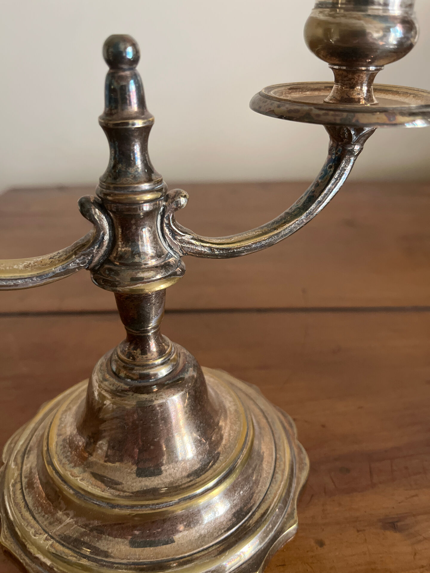 Pair of two-armed candelabra in silver-plated metal