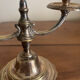 Pair of two-armed candelabra in silver-plated metal