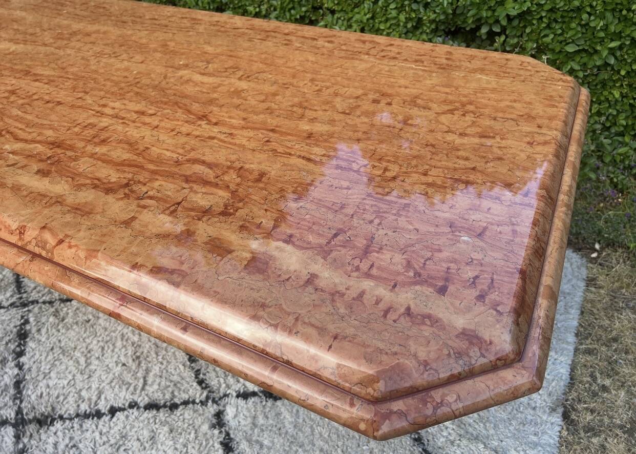 Large dining table in Rosso Alicante marble from the 70s-80s.