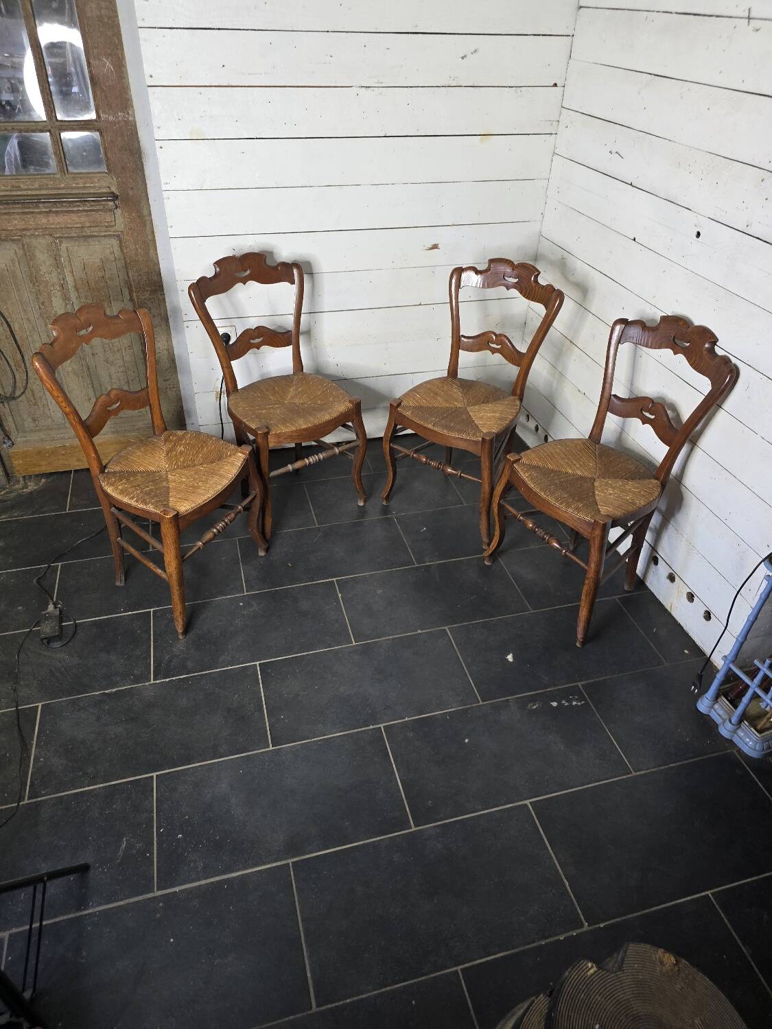 4 old straw chairs