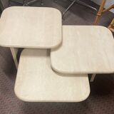 Modular pull-out coffee tables in travertine