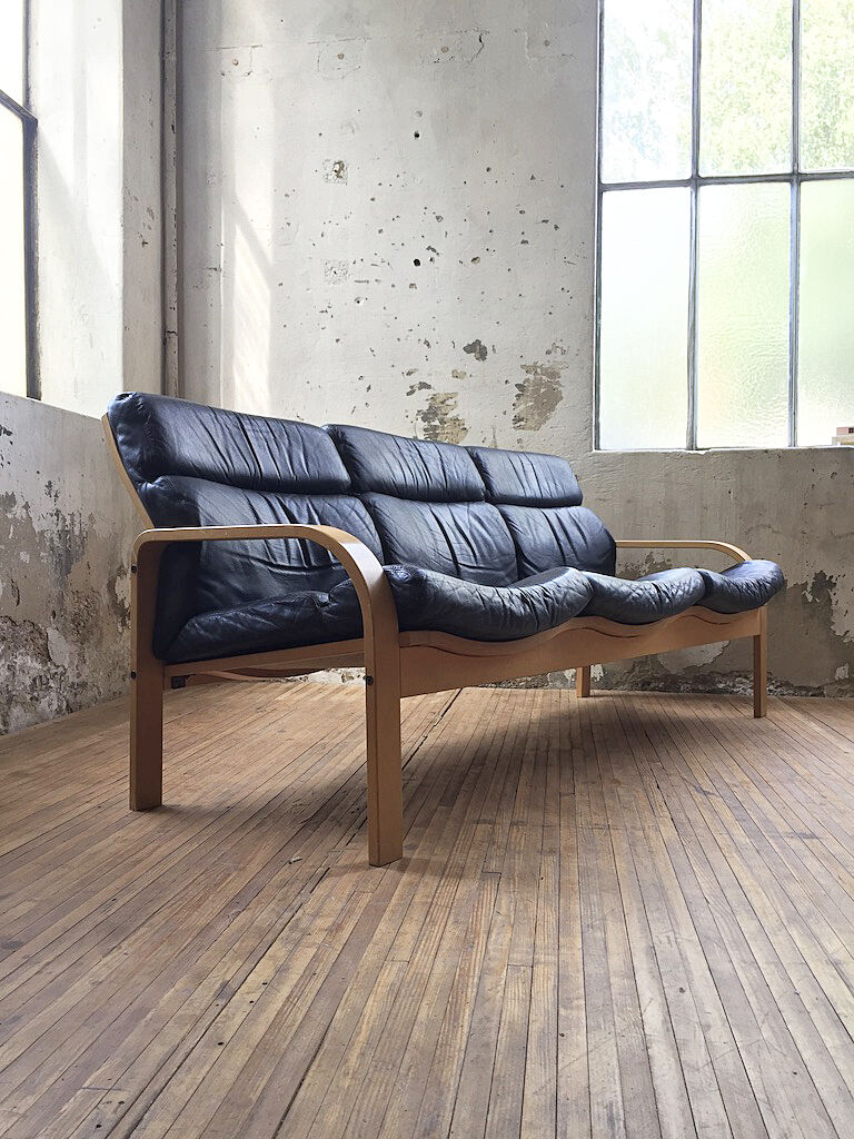 Danish sofa and armchairs curved wood and leather
