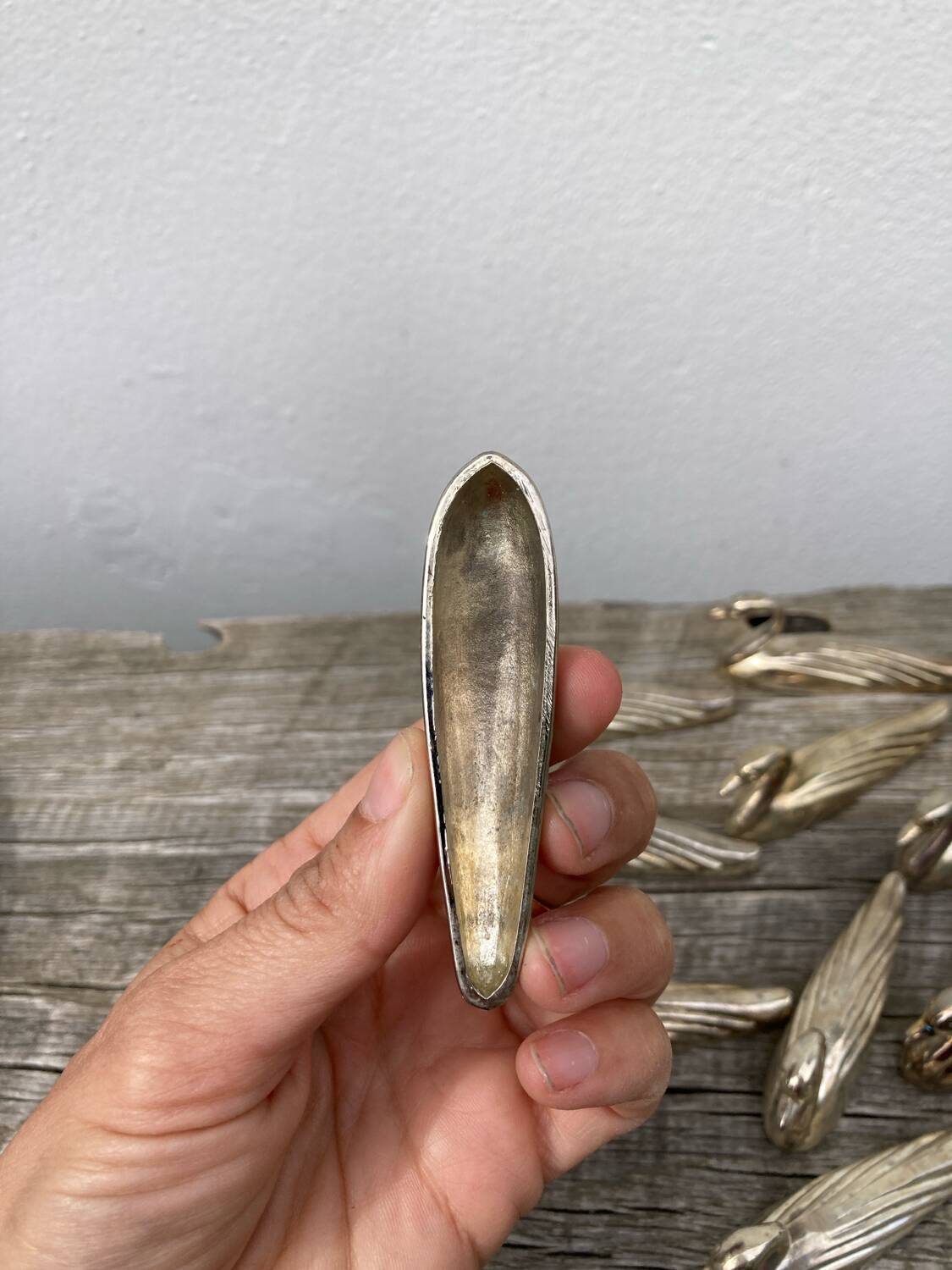 12 duck knife holders in silver metal