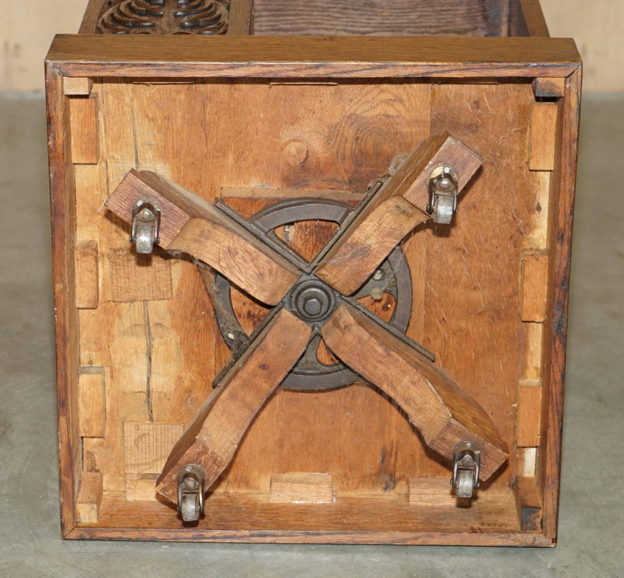 Victorian carved oak revolving library, circa 1880.