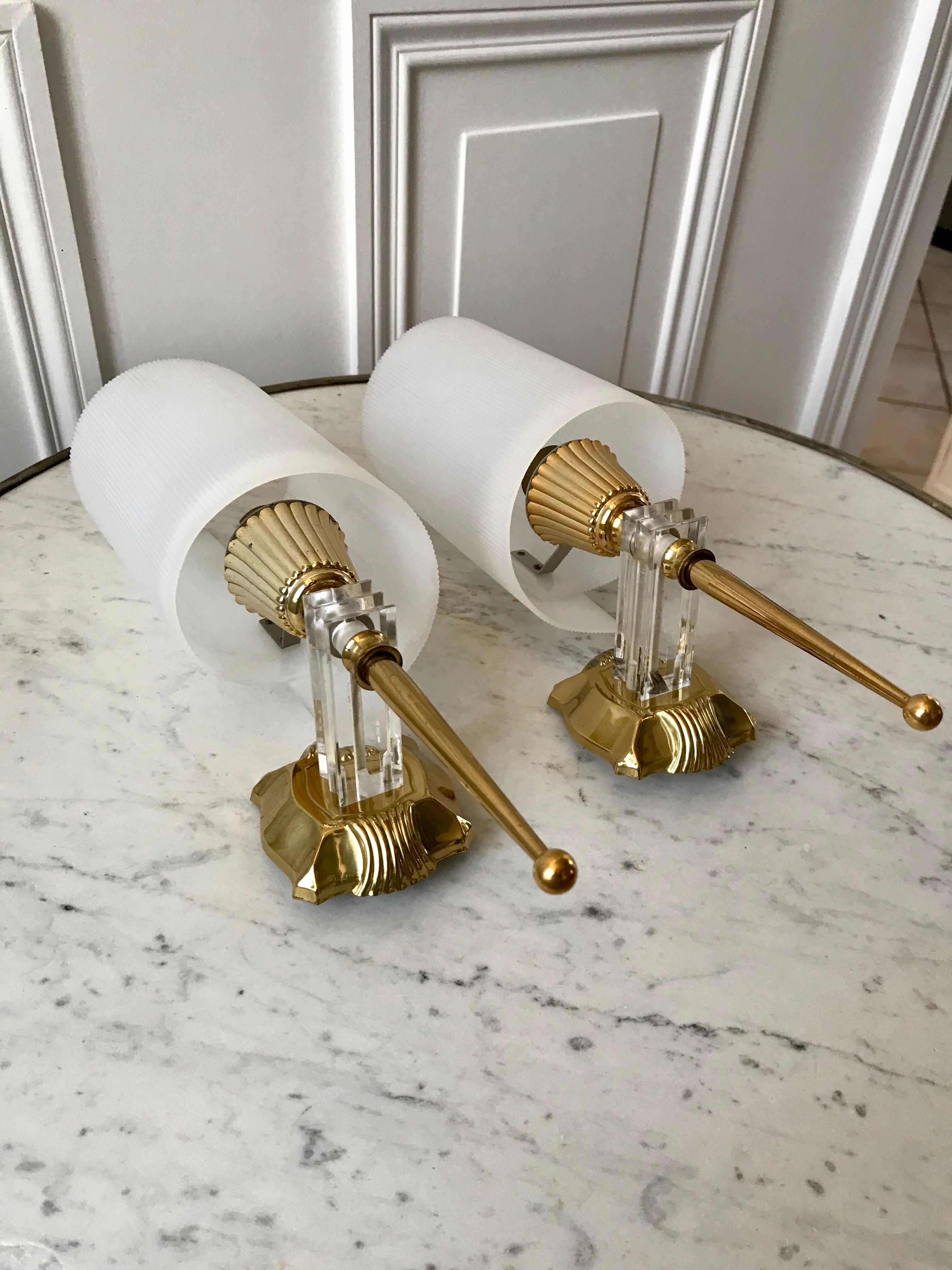 Pair of gold steel wall lamps, plexi and pleated plastic shades 60s-70s