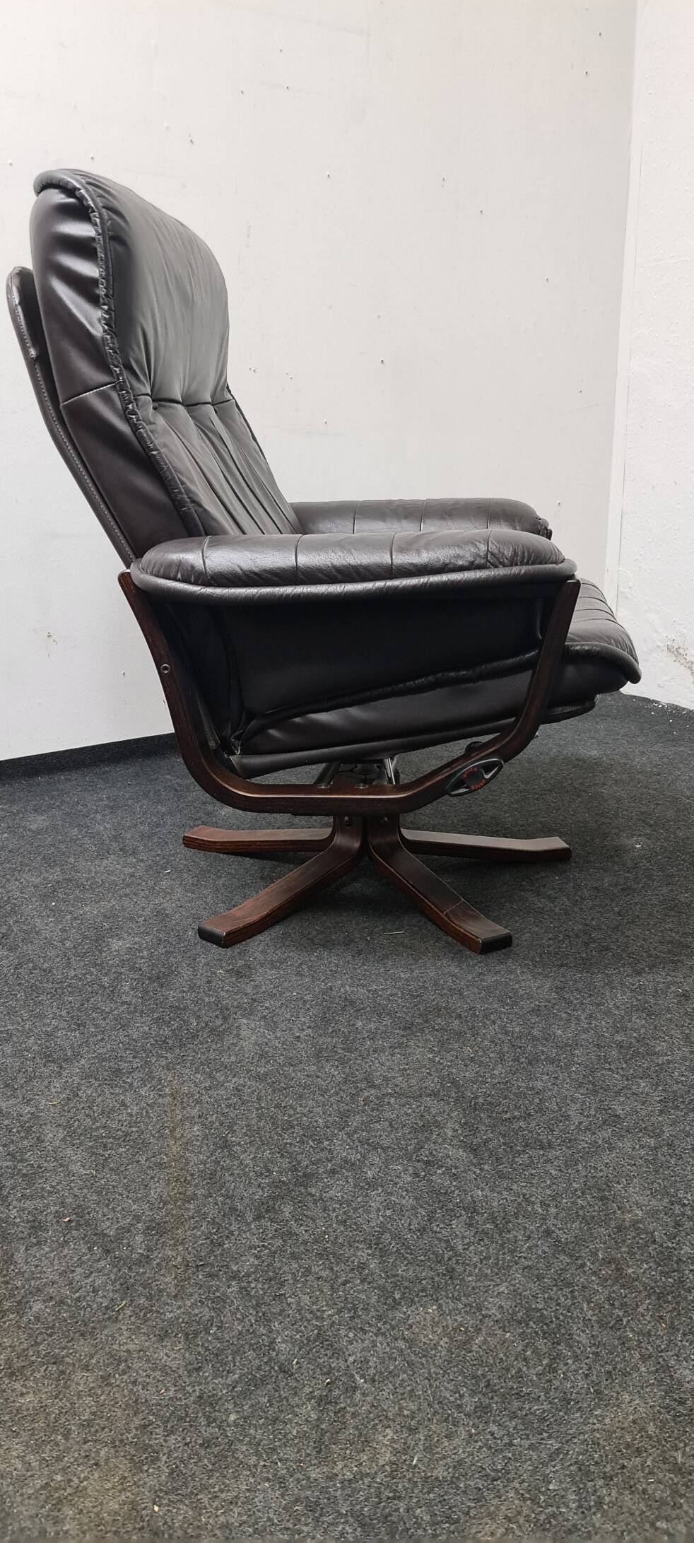 Vintage leather reclining swivel chair with foot stool