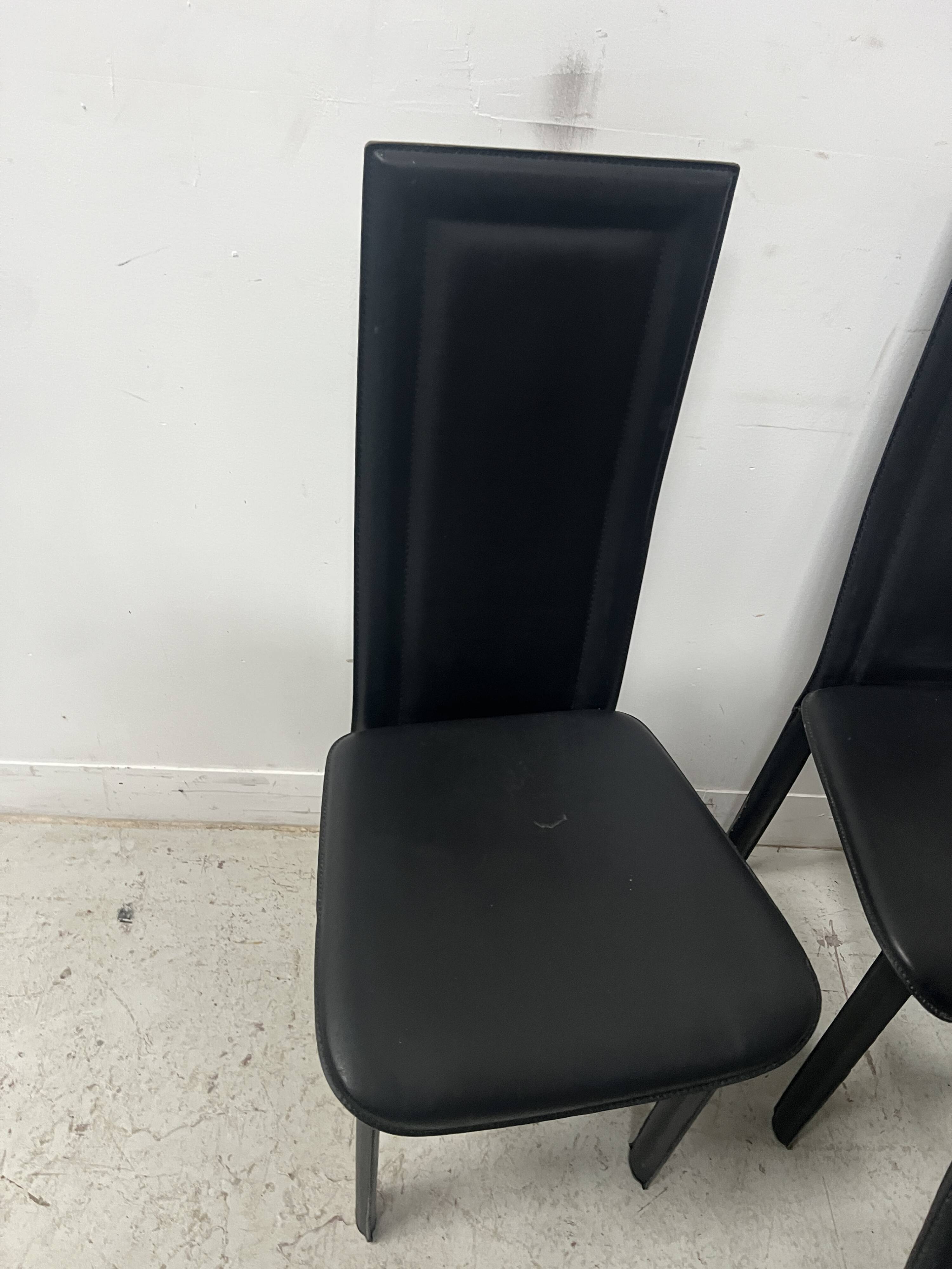 Set of eight designer chairs in black leather from the 20th century