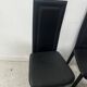 Set of eight designer chairs in black leather from the 20th century