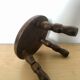 Low tripod stool in solid wood