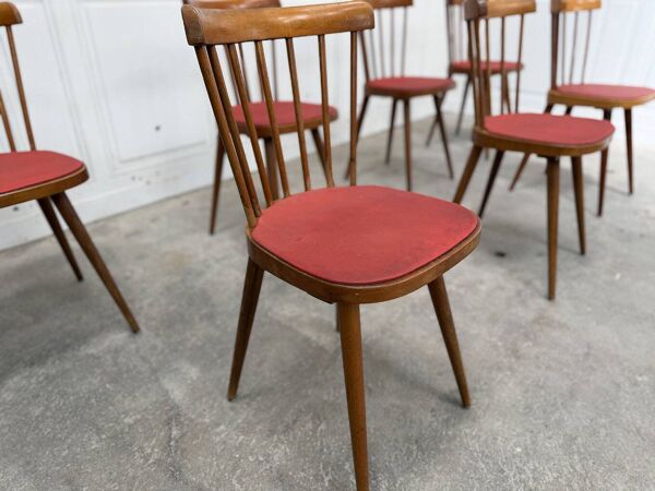 Huit chaises Baumann à assise colorée
