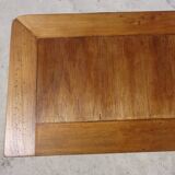 Chest of drawers with decorated handles in the Louis XVI style.