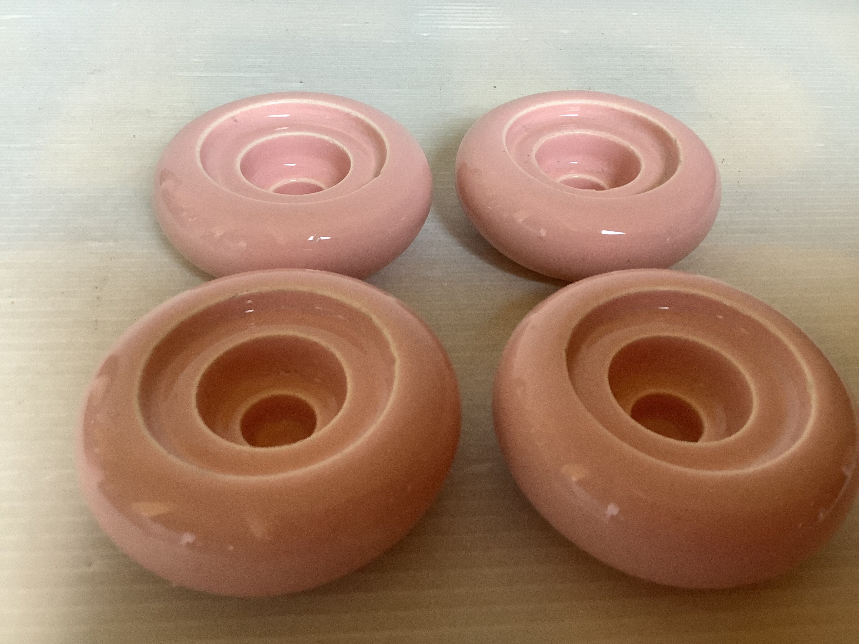 Four double pink candlesticks
