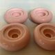 Four double pink candlesticks