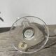 Pair of clear glass candlesticks, signed