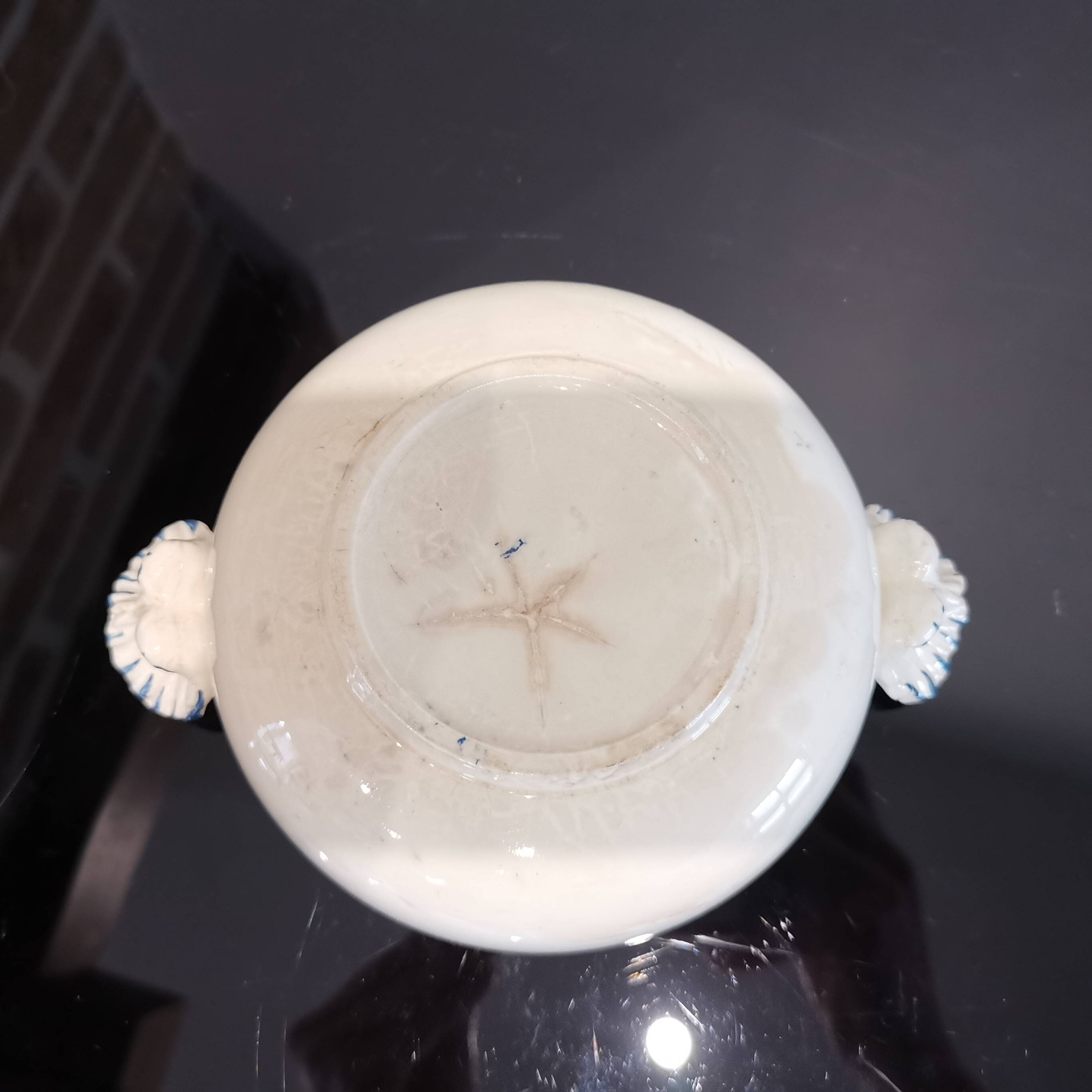 Butterfly ear bowl in iron clay with blue patterns