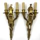 According to Jean-Charles Delafosse (1734-1791). Pair of bronze wall sconces.