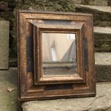 Miroir ancien en bois doré