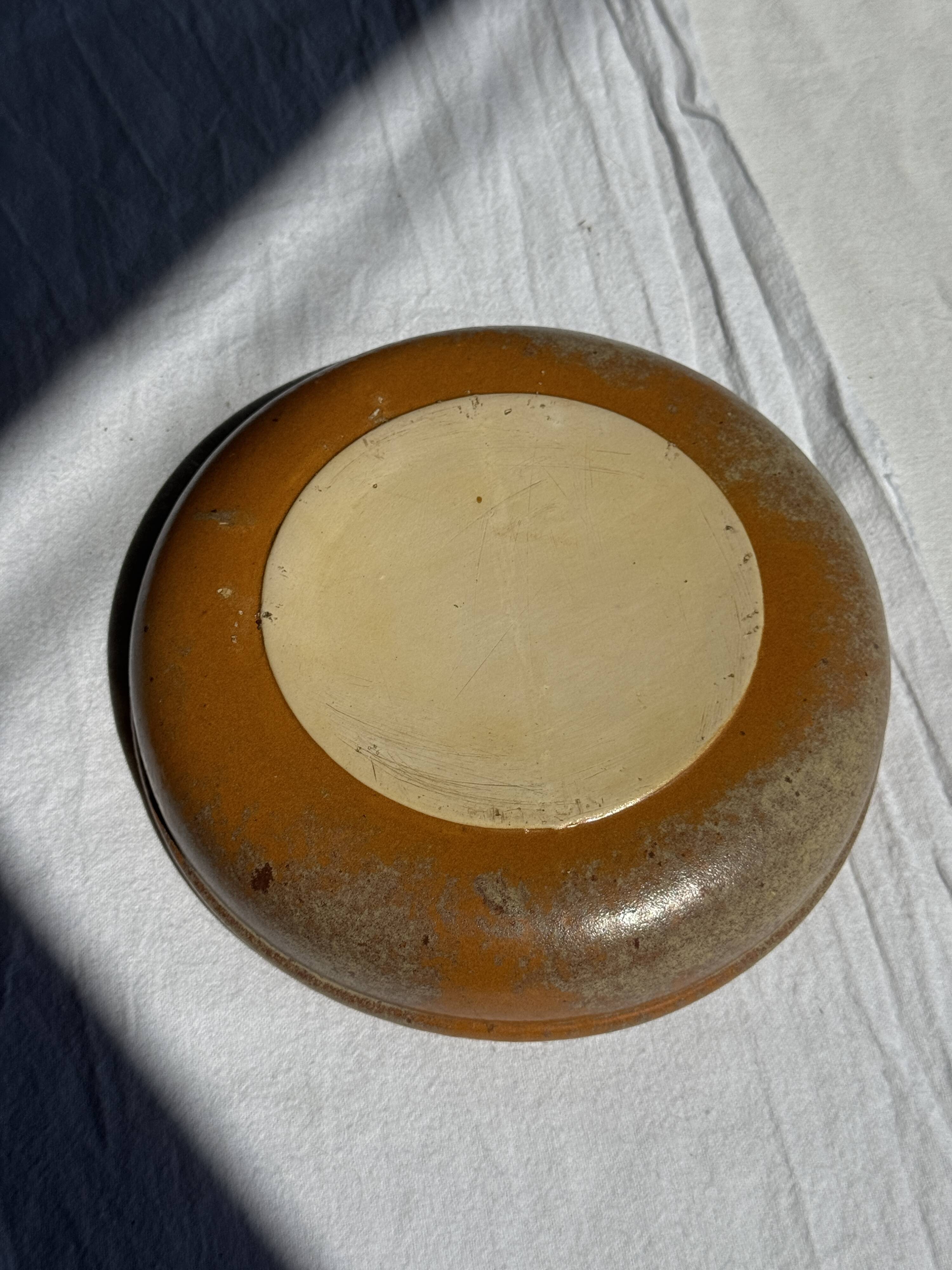 A small vintage circular stoneware deep dish D19