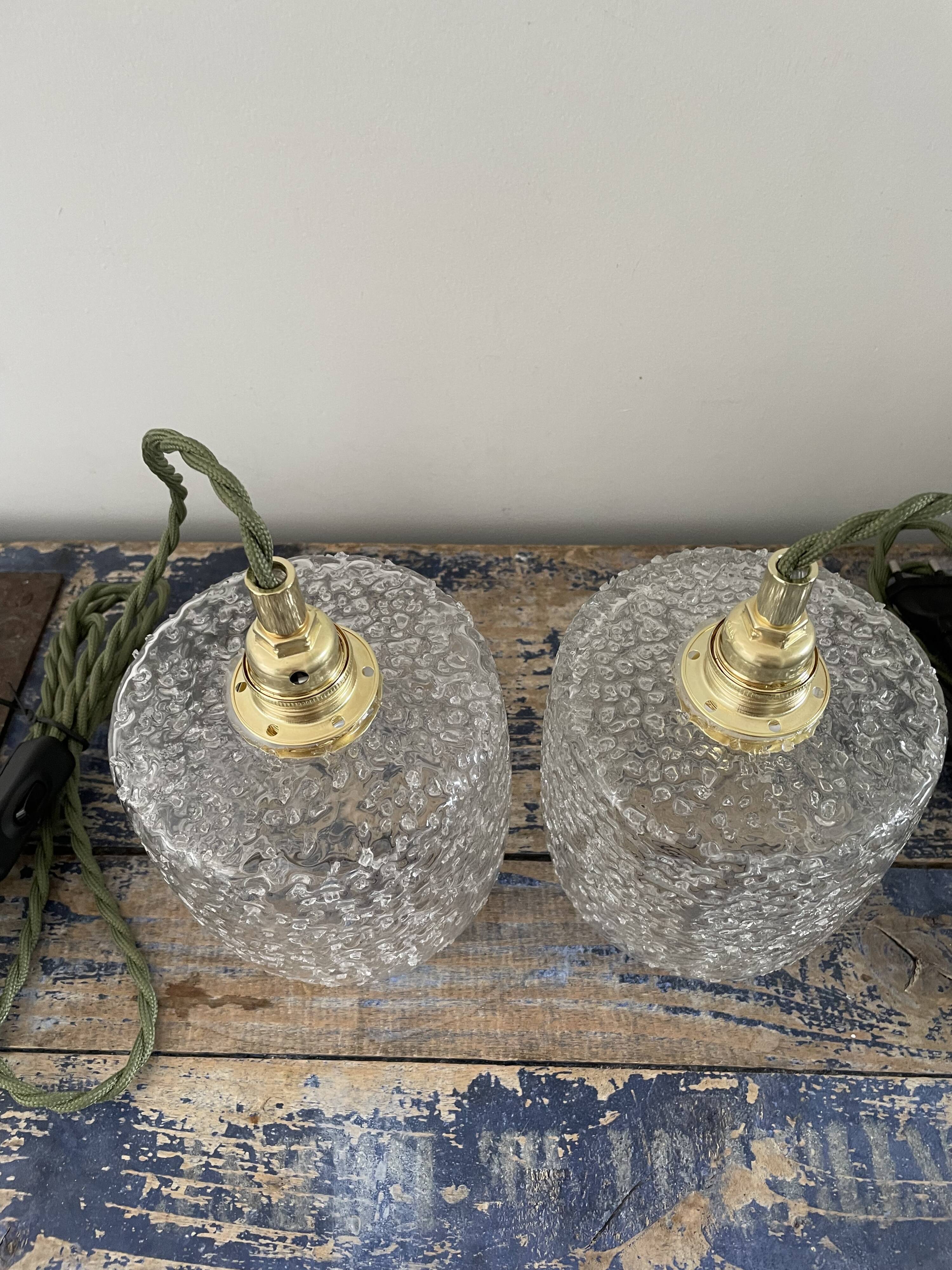 Set of two vintage bubbled glass handhelds
