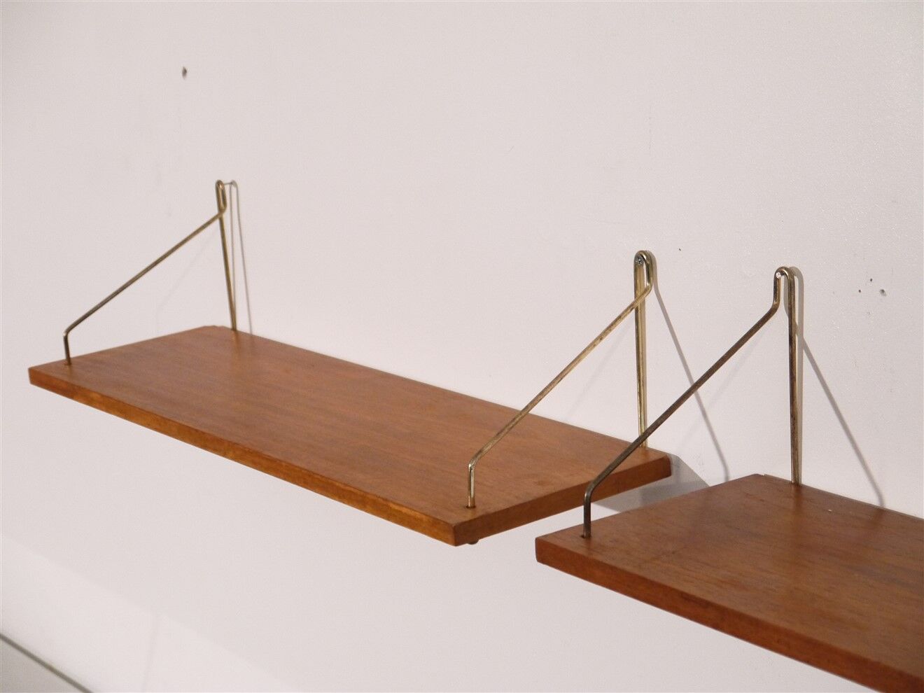 Pair of Danish teak and brass shelves 1960
