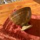 Speckled stoneware bowl on a stand