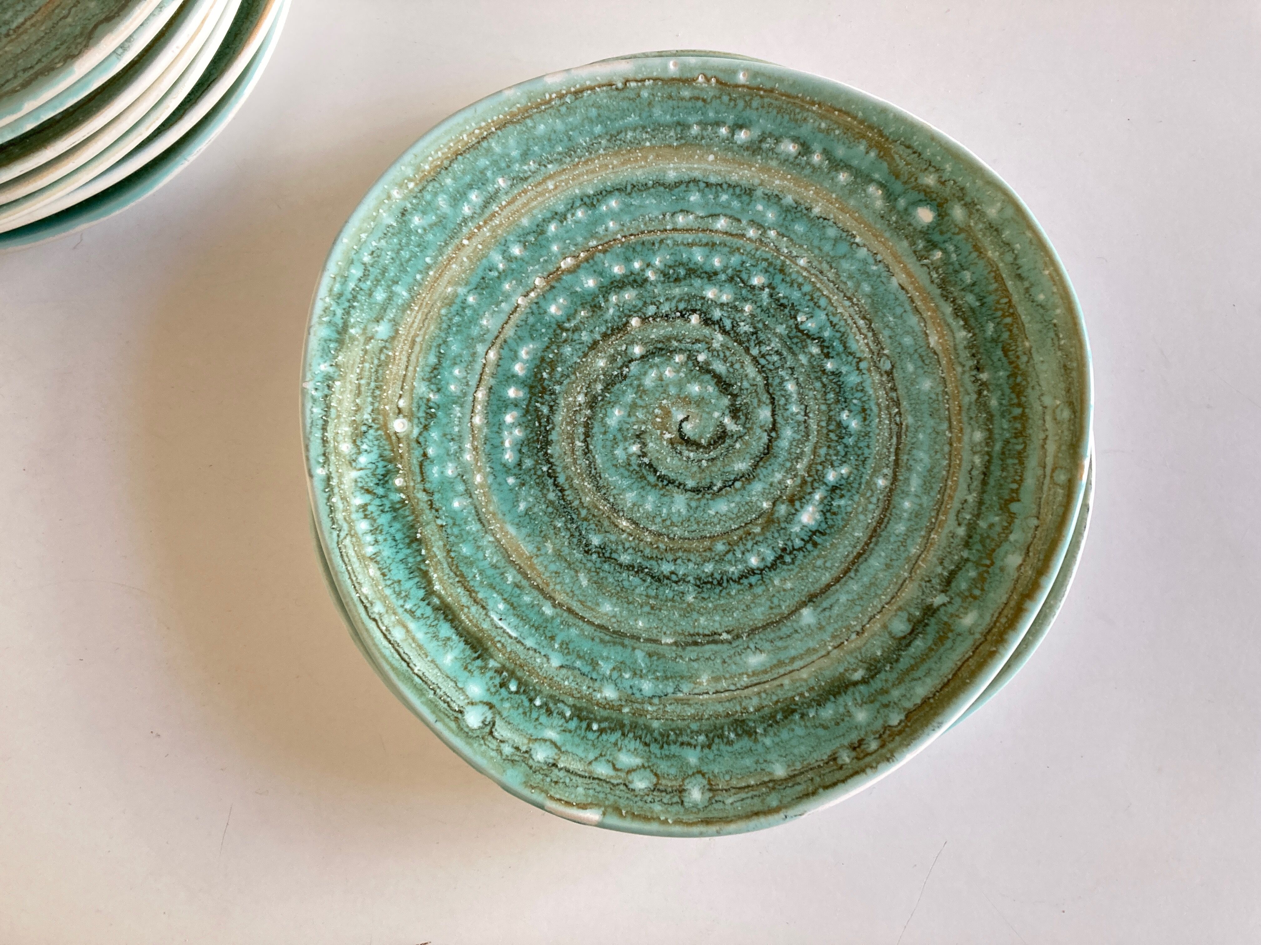 Set of 9 plates 1970 in stoneware Mousse de Nierderviller
