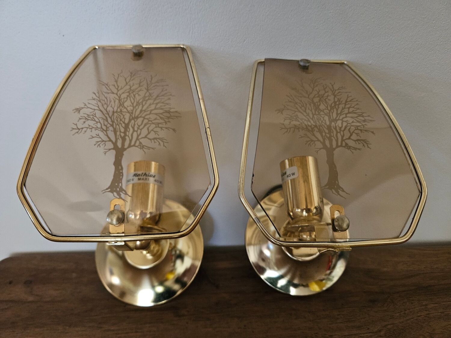 Pair of glass and metal wall lights