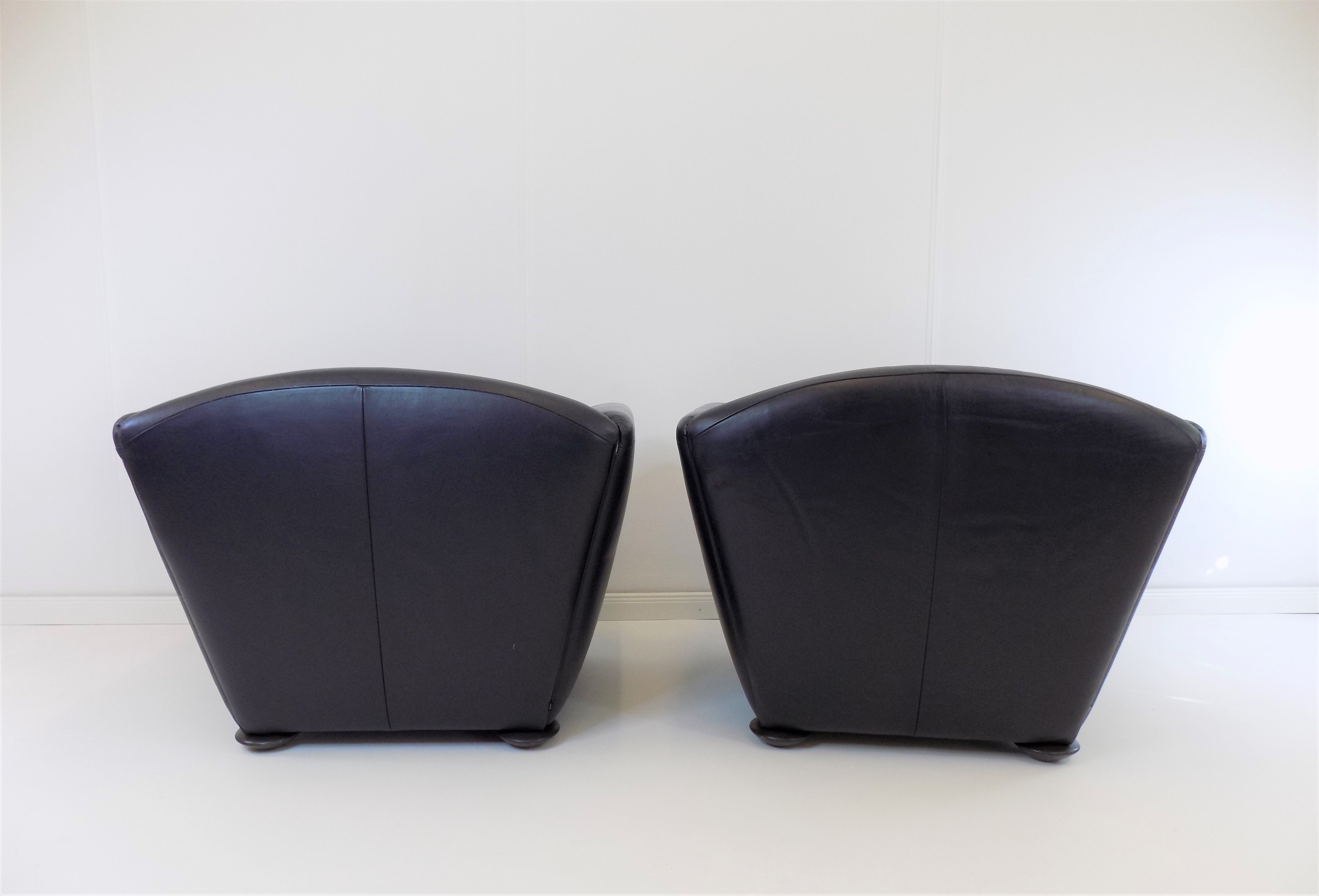 Set de 2 fauteuils en cuir par Peter Maly