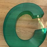 Letter signs C in transparent plexiglass