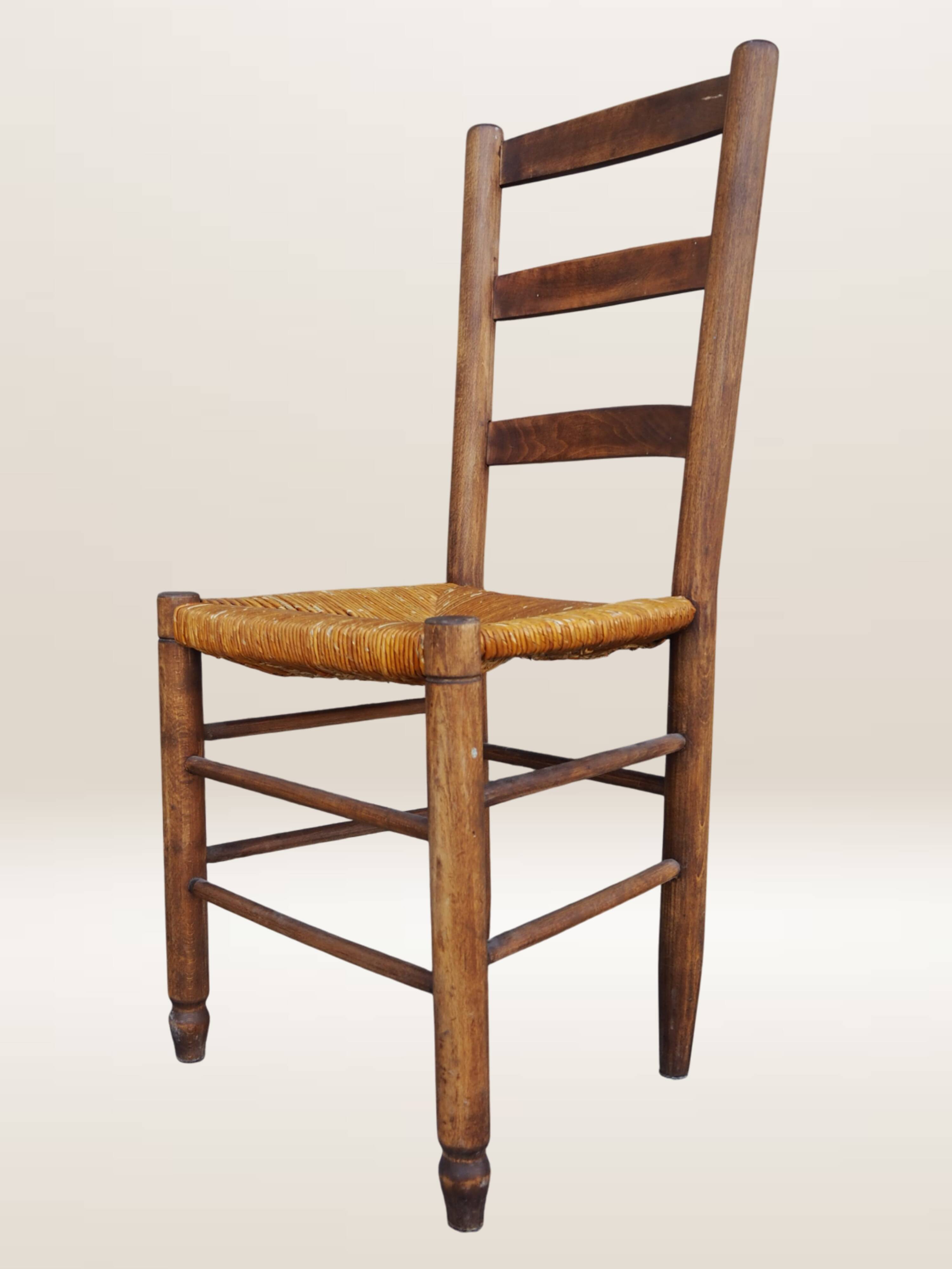 Set of six rush-seated ladderback chairs.
