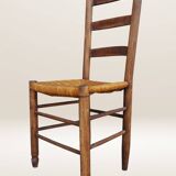 Set of six rush-seated ladderback chairs.