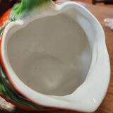 Orange slipware pitcher