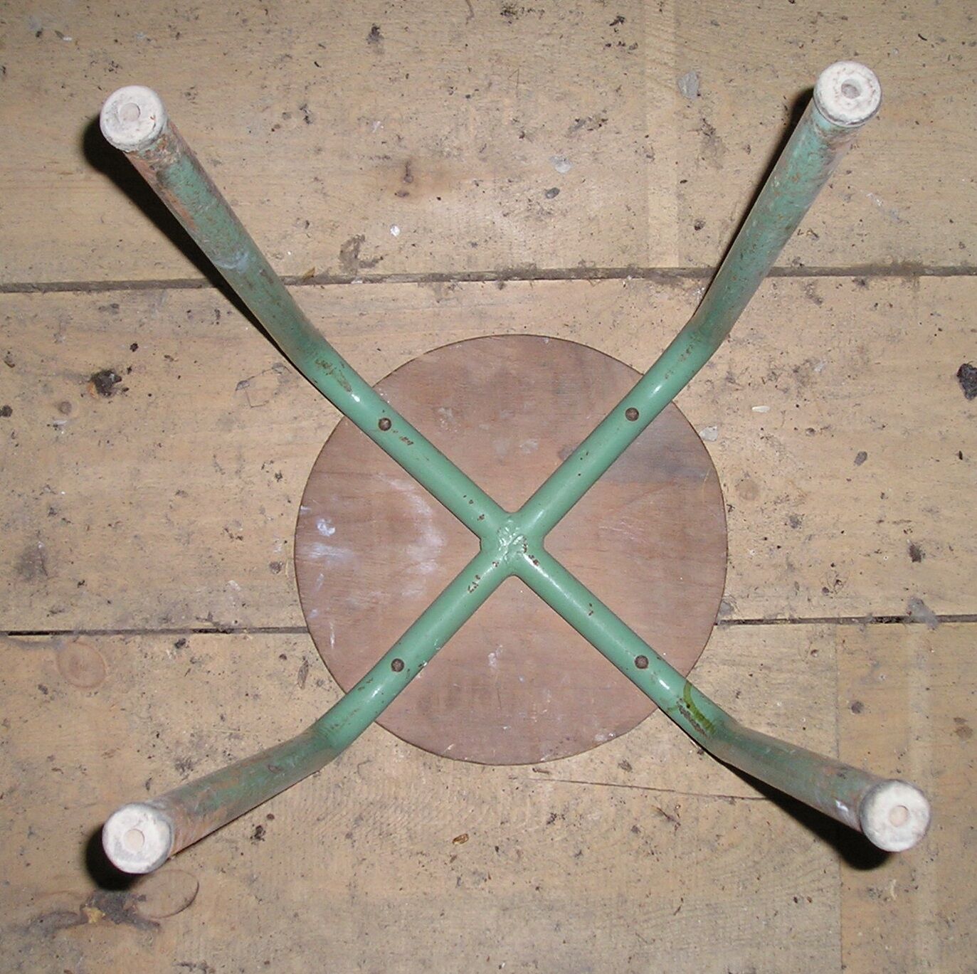 Old school stool made of metal and wood