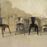 Four stackable chairs with industrial style