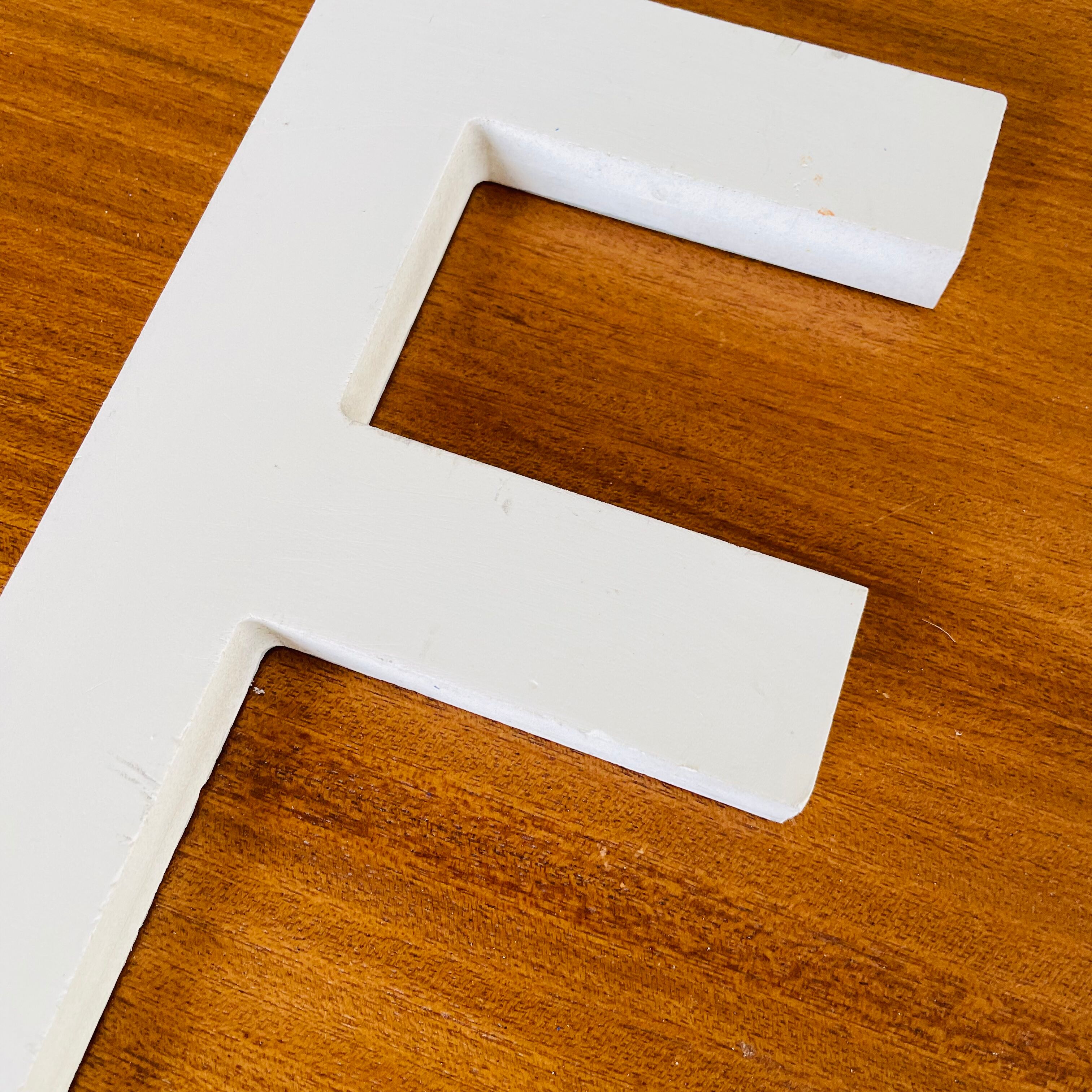 Wooden sign letter "F"