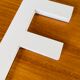 Wooden sign letter "F"