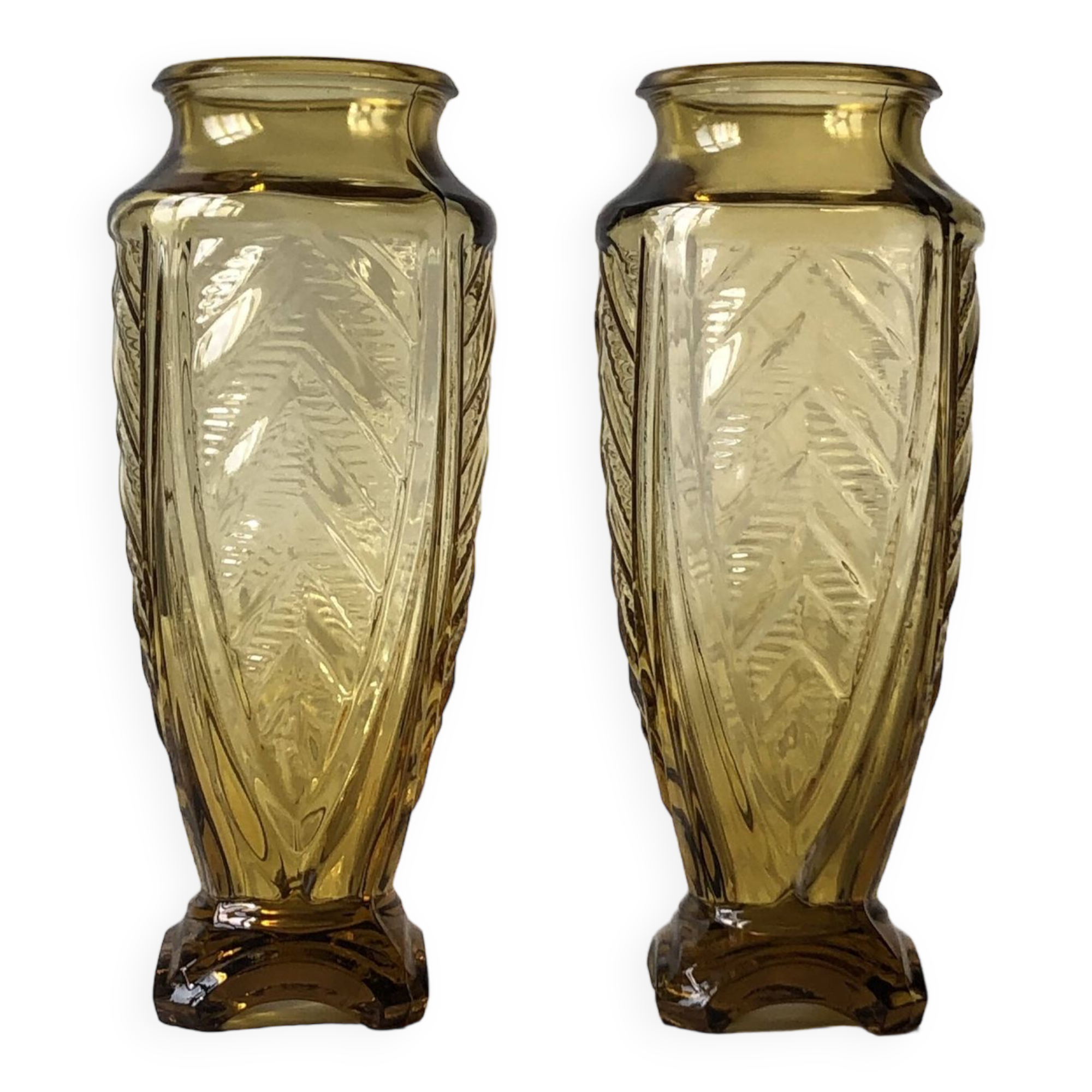 Duo of art deco vases in yellow glass with scroll patterns